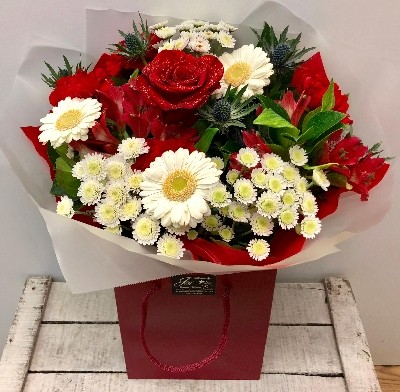 British bouquet of red, white and blue seasonal flowers. 