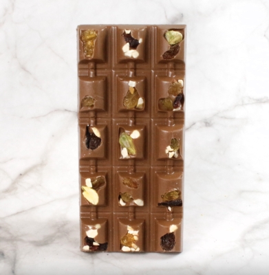 A Luxury Milk Chocolate Bar filled with Raisins, Golden Sultanas, Dried Cranberries, Pistachios and Hazelnuts.