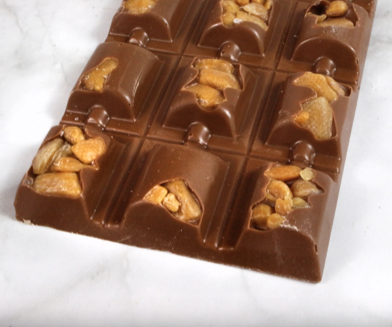 A Luxury Milk Chocolate Bar with Caramel Pieces and Sea Salt.