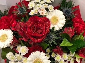 British bouquet of red, white and blue seasonal flowers. 