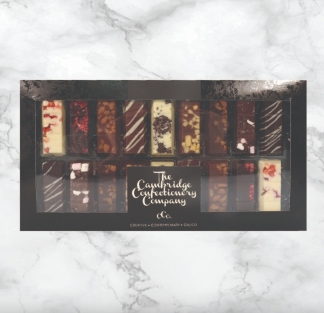 18 x Solid chocolate finger gift box featuring 9 of the best selling flavours. Including Dark Raspberry |  Dark Salted Caramel  |  Strawberries & Cream  |  Milk Salted Caramel  |  Honeycomb  |  Cookies & Cream  |  Rocky Road  |  Milk Chocolate Drizzle  |  Dark Chocolate Drizzle