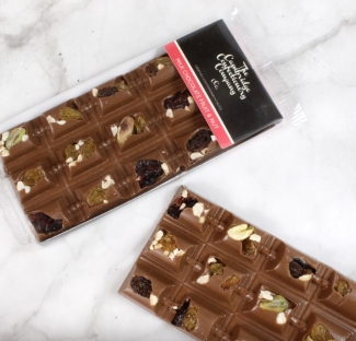 A Luxury Milk Chocolate Bar filled with Raisins, Golden Sultanas, Dried Cranberries, Pistachios and Hazelnuts.