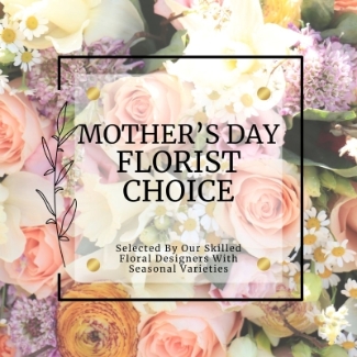 Florist choice gift bouquet created in soft colour tones perfect for Mother's Day. Design comes presented in cellophane wrap in our signature gift bag. 